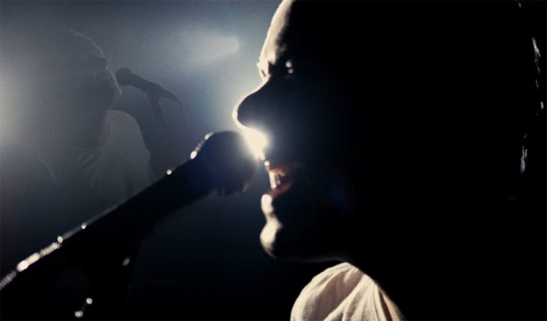 A screenshot from the music video for Nighthawk's 'Right Time'