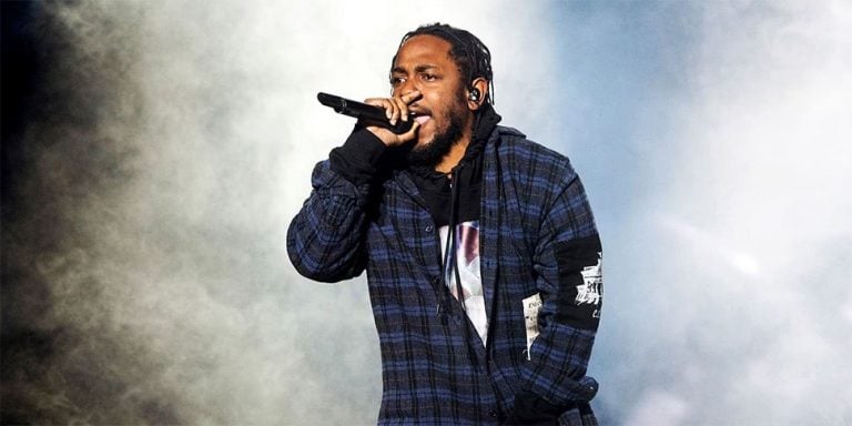 Kendrick Lamar reflects on music, shares huge stack of tour photos