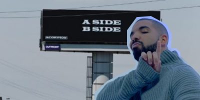 Drake in front of Billboard