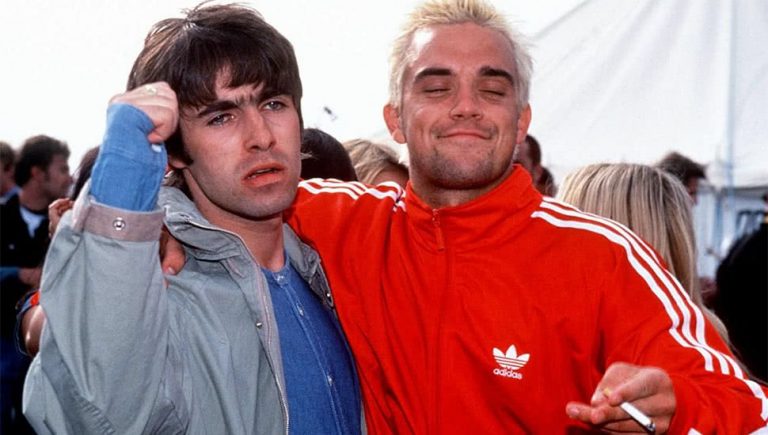 Oasis' Noel Gallagher and Take That's Robbie Williams at Glastonbury in 1995.