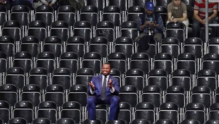 A doctored image of 50 Cent supposedly attending a Ja Rule gig