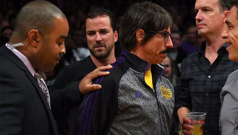 The Red Hot Chili Peppers' Anthony Kiedis being removed from an LA Lakers game