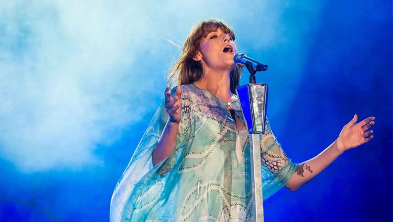 Florence Welch of Florence + The Machine performing live