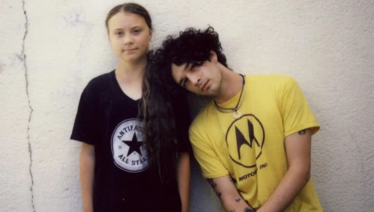 Image of Matty Healy of The 1975 with climate change activist Greta Thurnberg