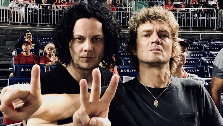 Image of Jack White and Brendan Benson at a baseball game