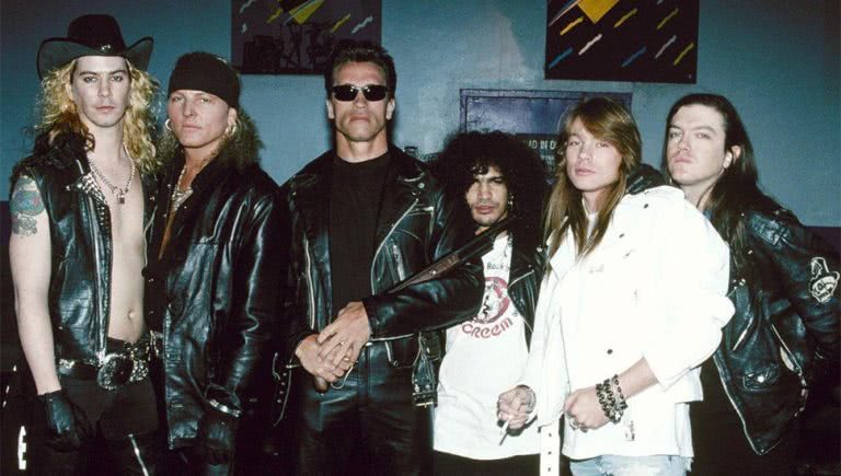 Image of Guns N' Roses with Arnold Schwarzenegger while supporting 'Terminator 2: Judgement Day'