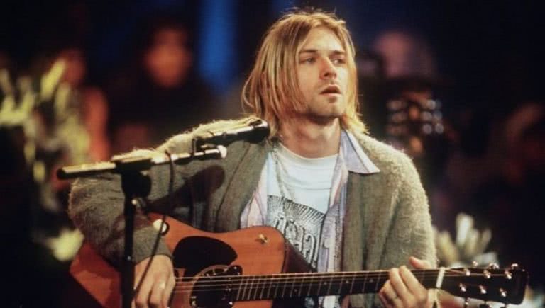 Kurt Cobain wearing his iconic cardigan during Nirvana's 'MTV Unplugged' set