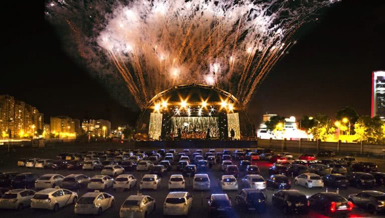 Photo of a drive-in concert.