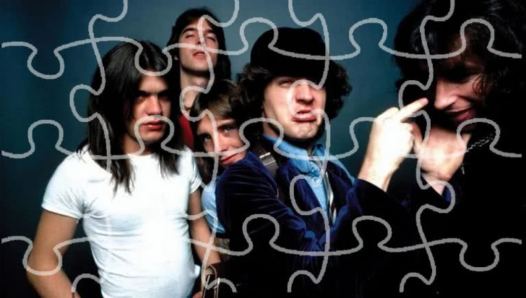 Iconic rockers AC/DC with a puzzle pattern over them.