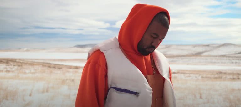 DONDA Kanye West standing in desert in Follow God music video