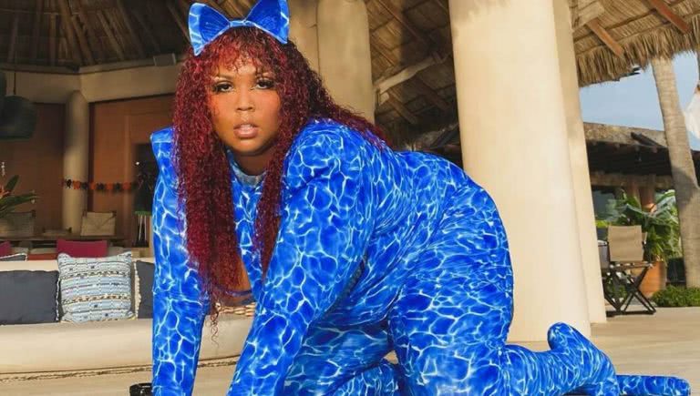 Lizzo gets half-naked for democracy