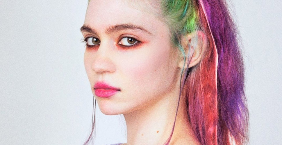 Grimes teases new song Player Of Games with messages in binary code