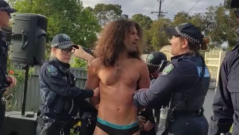 Half-naked Australian guitarist arrested for shredding