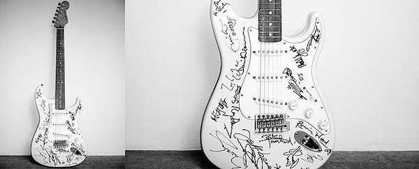 Guitar signed by multiple musicians