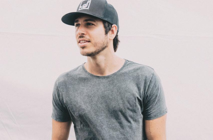 Australian country crossover star Morgan Evans goes gold, drops new video