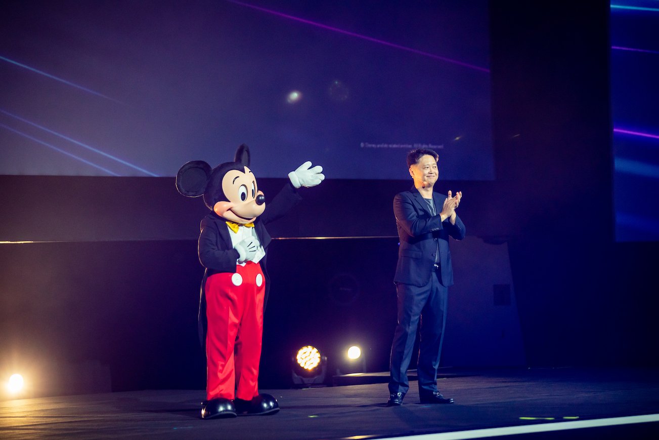 Luke Kang and Mickey Mouse on